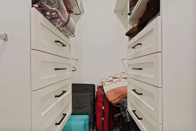 a en suite bathroom with a sink and a mirror