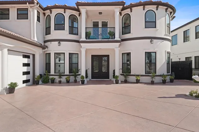 a kitchen with a sink stove and refrigerator