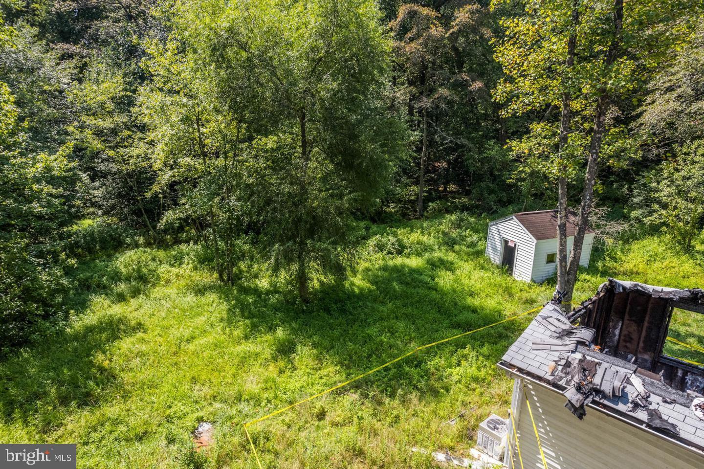 8280 Elvaton Road Millersville, MD 21108 - Photo 2 of 6 a view of a house with a yard