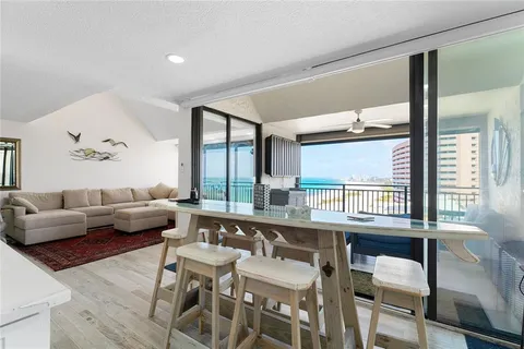 a view of balcony with furniture