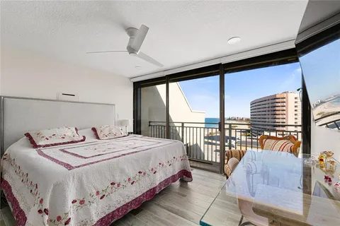 a view of balcony with a swimming pool
