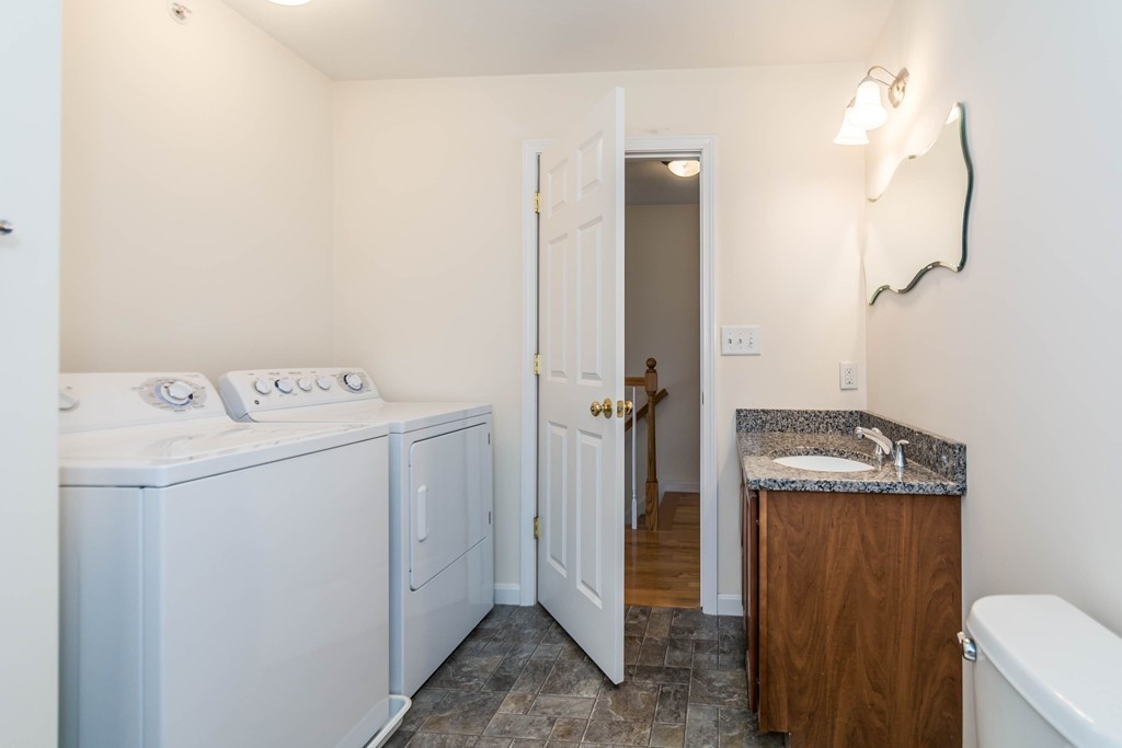 41 Boston Road, Unit 124 Billerica, MA 01862 - Photo 15 of 18 a utility room with dryer and washer
