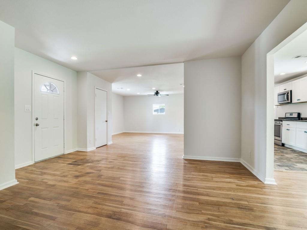 2315 Inadale Avenue Dallas, TX 75228 - Photo 4 of 36 a view of empty room with wooden floor
