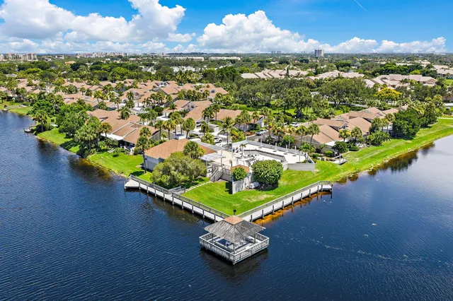 a view of a terrace with couches and city view