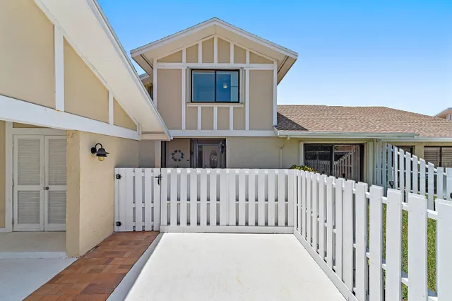 a front view of a house with entrance