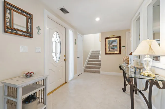 a view of livingroom with furniture and window