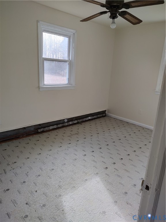 1892 York River Road Shacklefords, VA 23156 - Photo 4 of 6 an empty room with a window