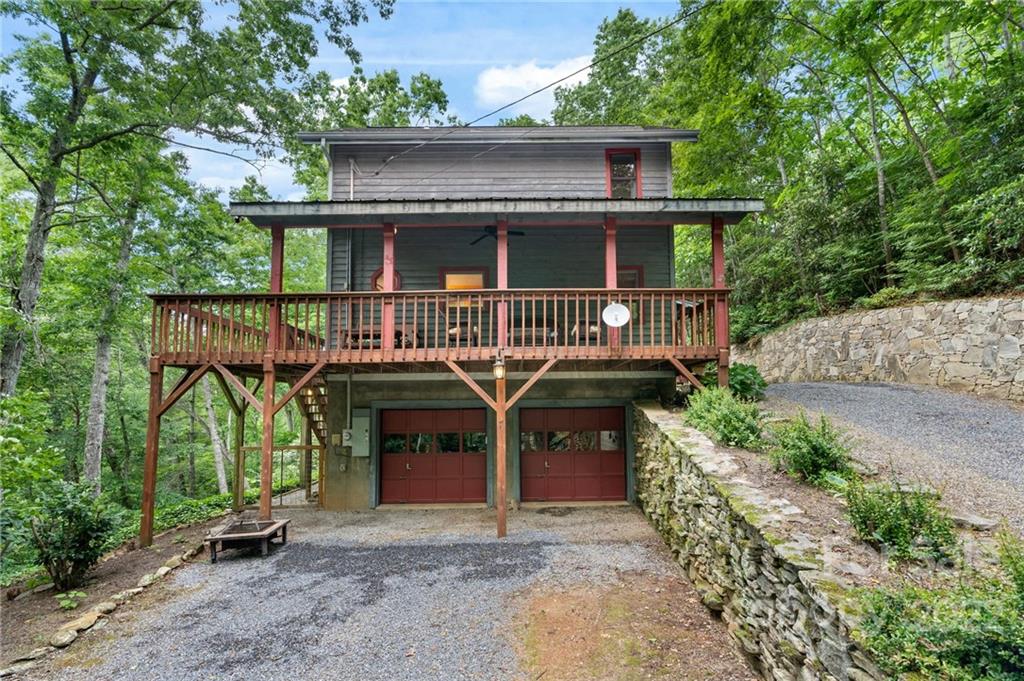 7 Twin Mountain View Road Canton, NC 28716 - Photo 2 of 36 a front view of a house with garden