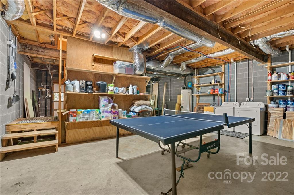 7 Twin Mountain View Road Canton, NC 28716 - Photo 26 of 36 a view of a tables and chairs in patio