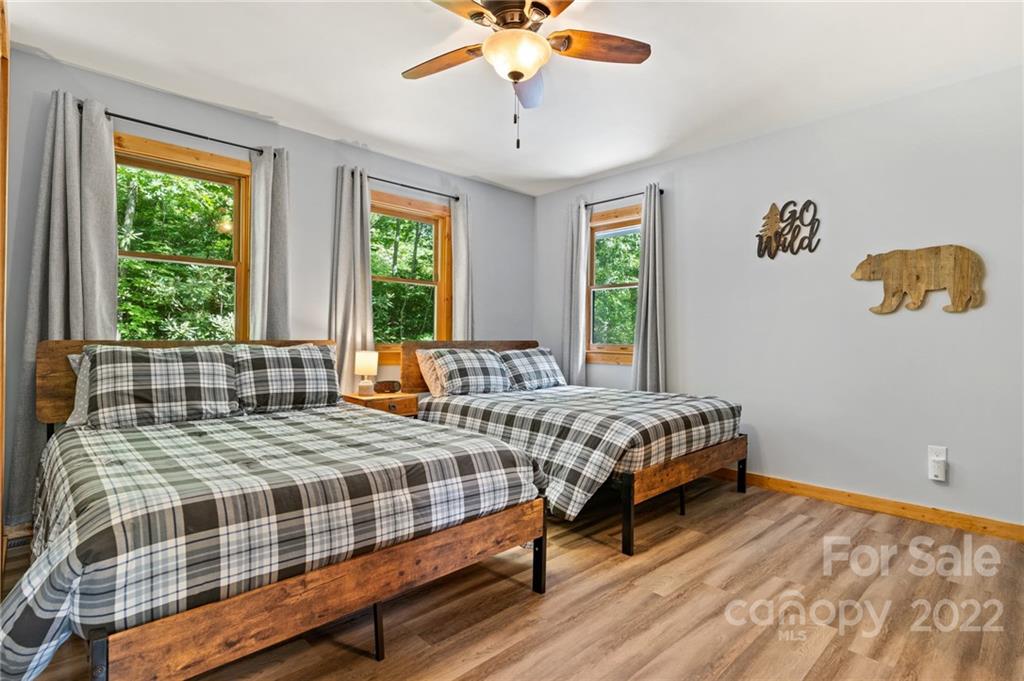 7 Twin Mountain View Road Canton, NC 28716 - Photo 30 of 36 a bedroom with a bed and window