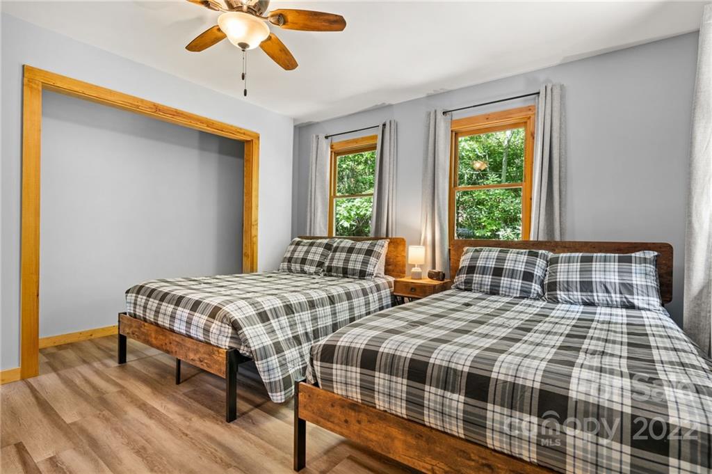 7 Twin Mountain View Road Canton, NC 28716 - Photo 31 of 36 a bedroom with a bed and window