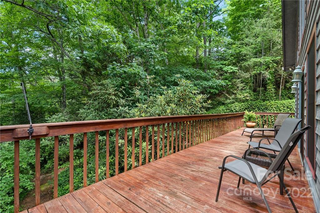 7 Twin Mountain View Road Canton, NC 28716 - Photo 8 of 36 a view of a two chairs in the deck
