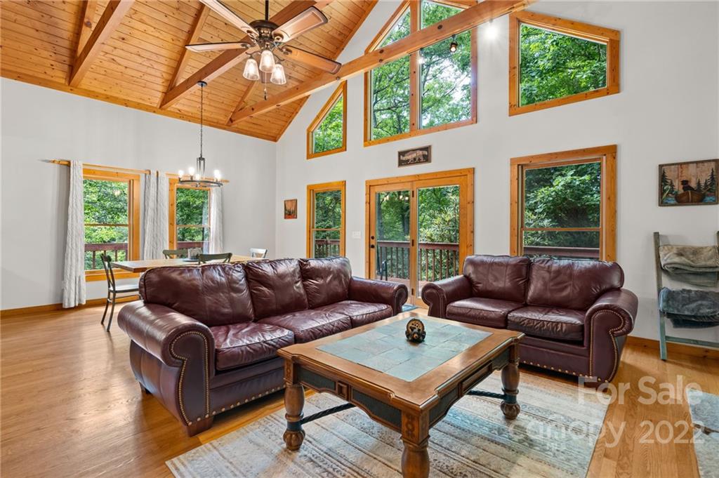7 Twin Mountain View Road Canton, NC 28716 - Photo 9 of 36 a living room with furniture and a large window