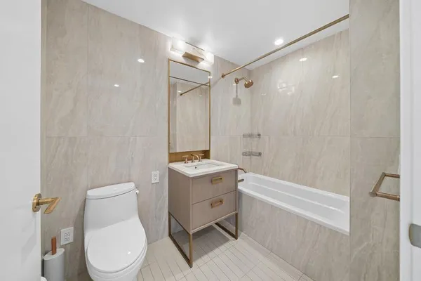 a terrace with outdoor seating and kitchen view