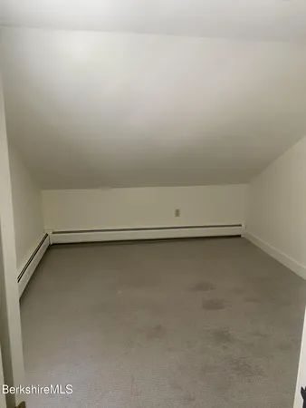 a view of a room with an empty space