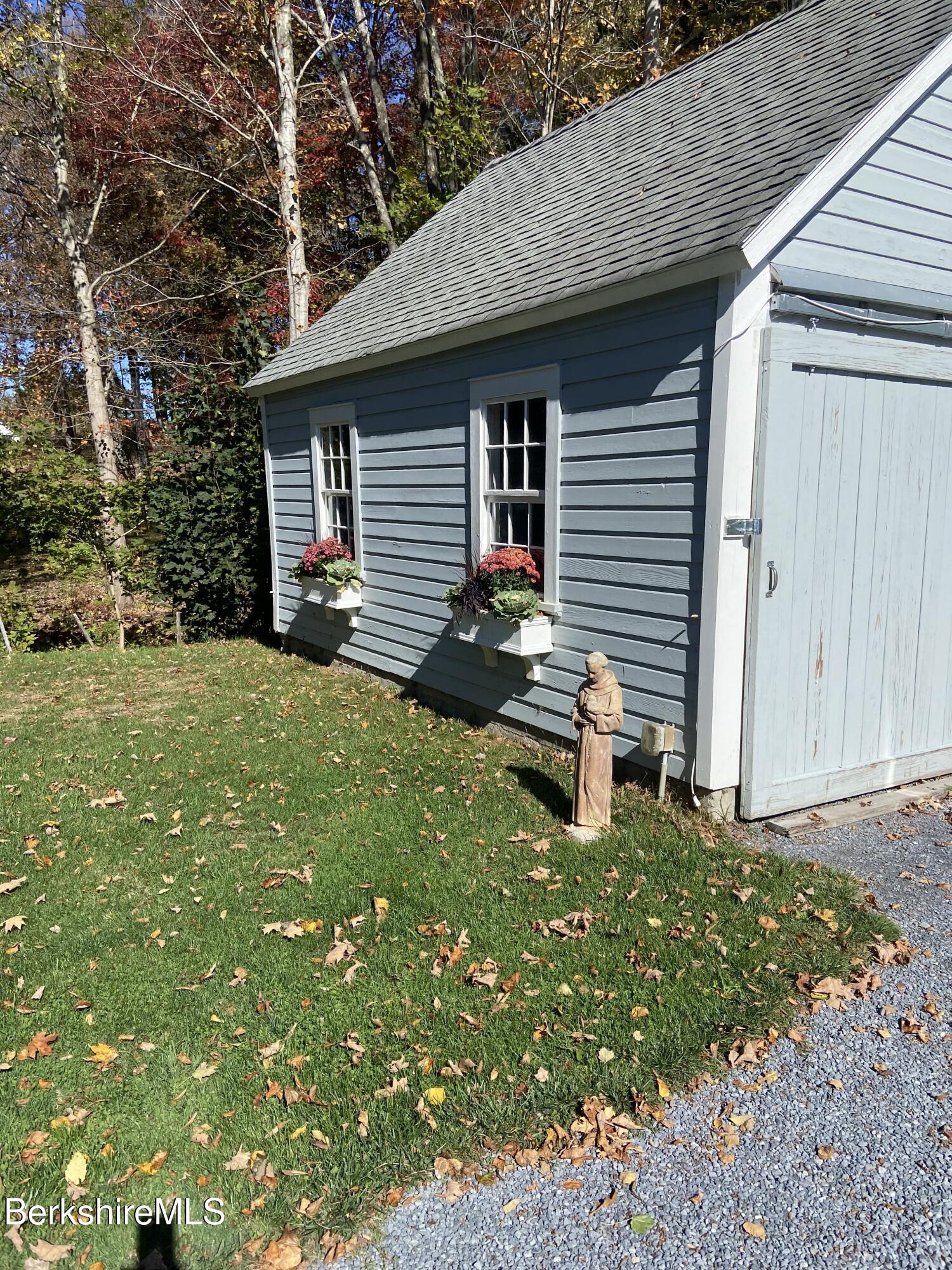 910 North Hoosac Road Williamstown, MA 01267 - Photo 22 of 22 a backyard of a house with seating space