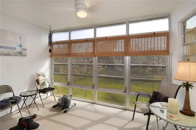 a room with furniture and a window