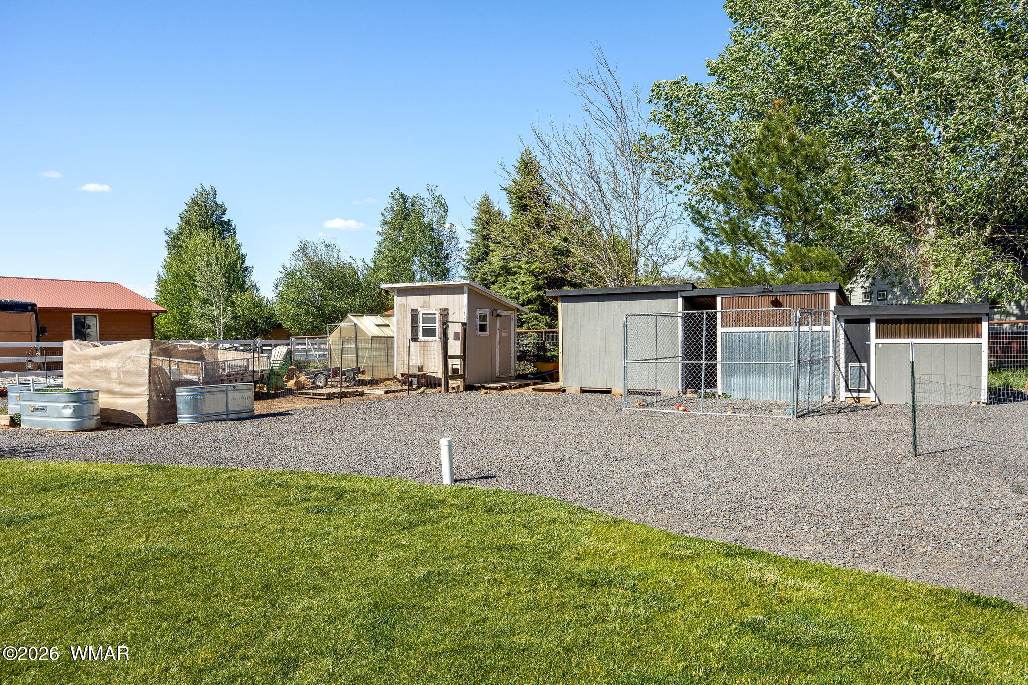1940 Stonegate Way Heber, AZ 85928 - Photo 52 of 62 a front view of a house with a yard and garage