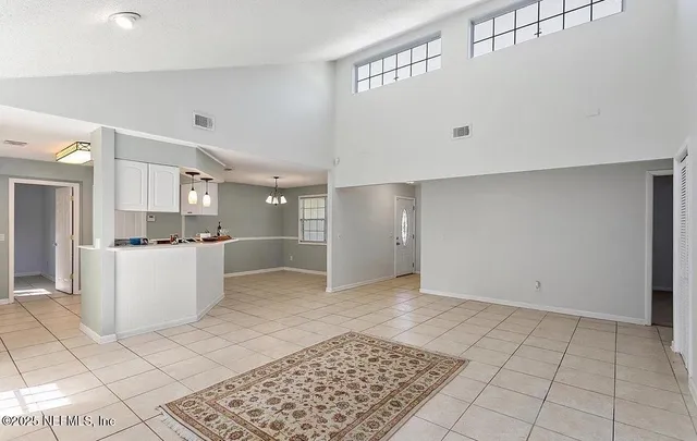 a view of a kitchen with a sink