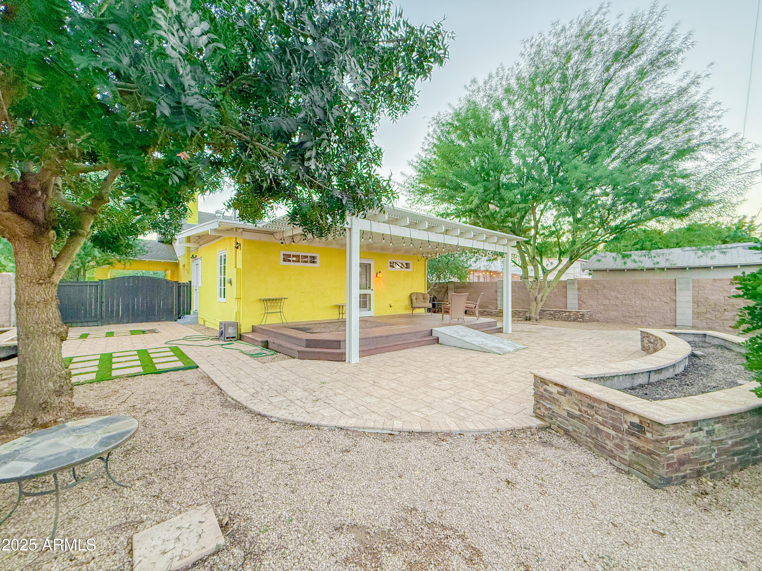 56 East Vernon Avenue Phoenix, AZ 85004 - Photo 27 of 29 a view of a house with backyard and sitting area