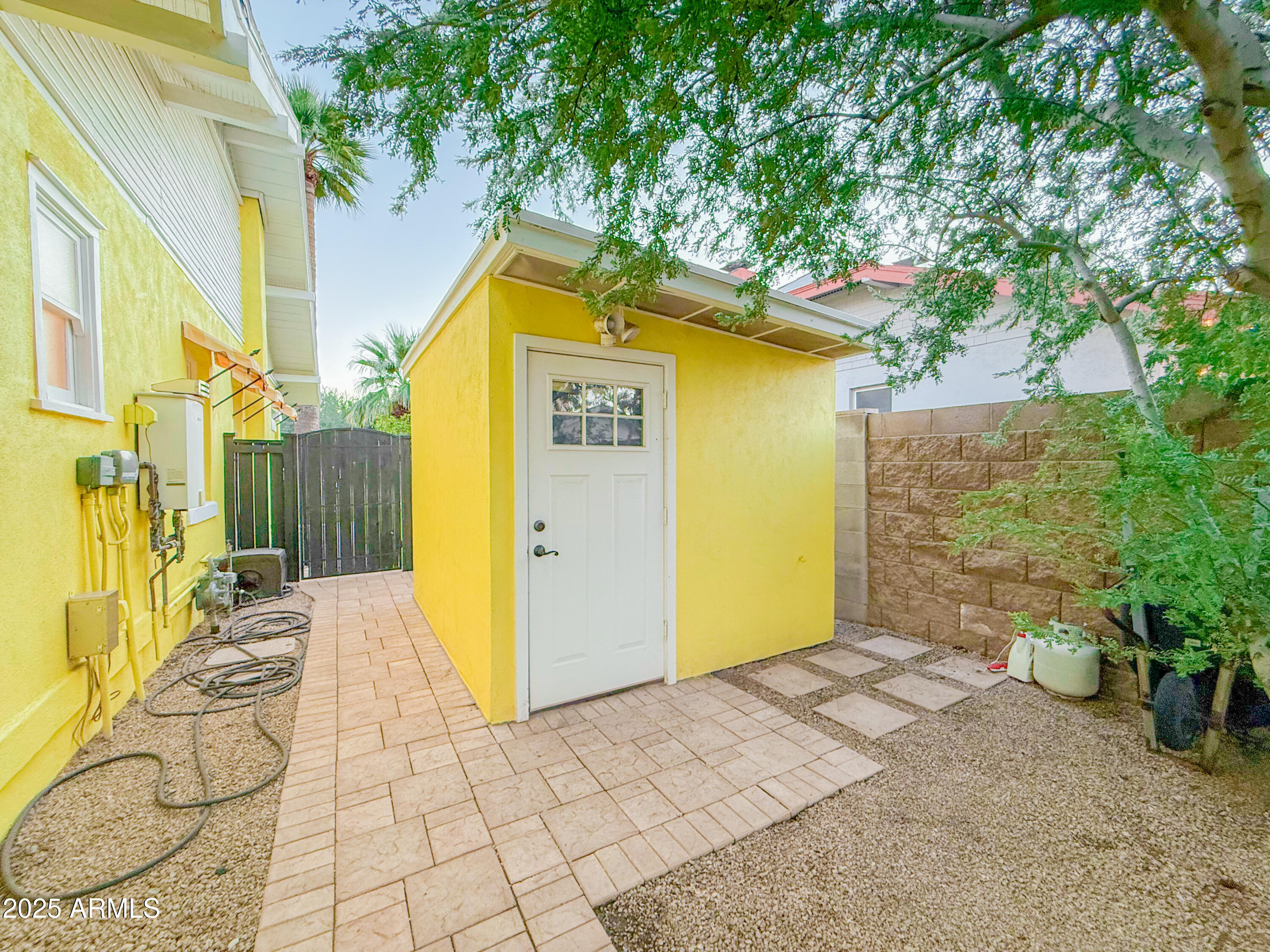 56 East Vernon Avenue Phoenix, AZ 85004 - Photo 28 of 29 a view of a house with wooden fence