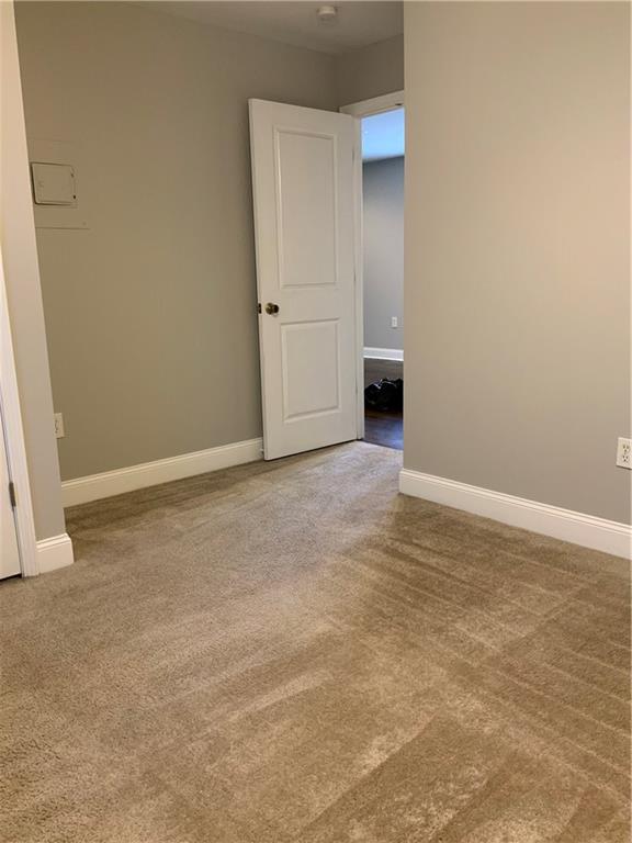 805 Piedmont Avenue Northeast, Unit 5 Atlanta, GA 30308 - Photo 8 of 12 a view of an empty room