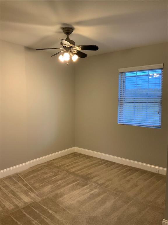 805 Piedmont Avenue Northeast, Unit 5 Atlanta, GA 30308 - Photo 9 of 12 a view of a room with a fan