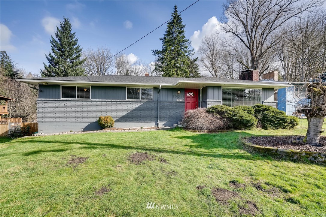 17810 98th Avenue South Renton, WA 98055 - Photo 1 of 28 a front view of house with yard and trees around