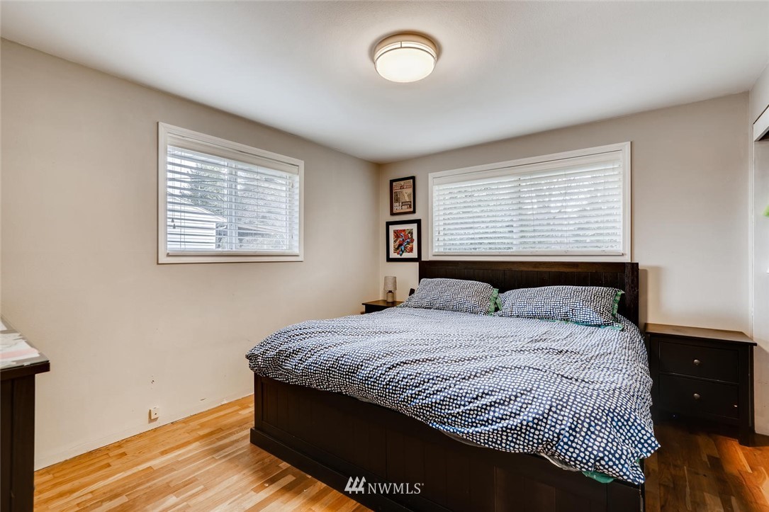 17810 98th Avenue South Renton, WA 98055 - Photo 12 of 28 a bedroom with a bed and a window
