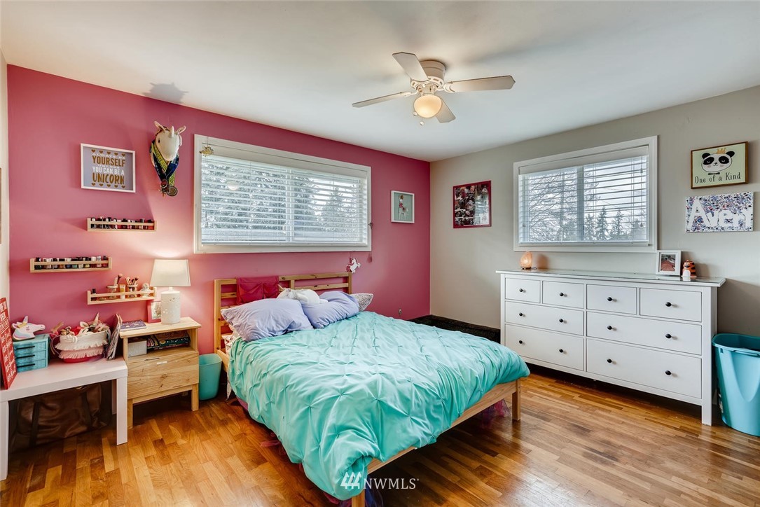 17810 98th Avenue South Renton, WA 98055 - Photo 15 of 28 a bedroom with a bed and a dresser