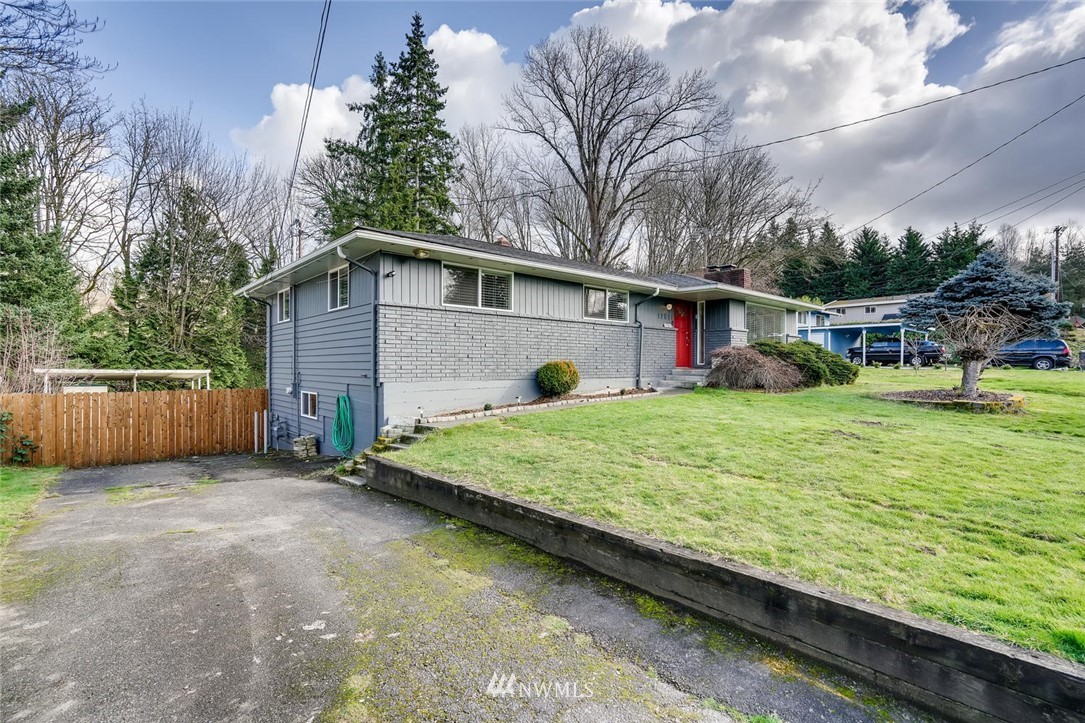 17810 98th Avenue South Renton, WA 98055 - Photo 26 of 28 a view of an house with backyard space and balcony