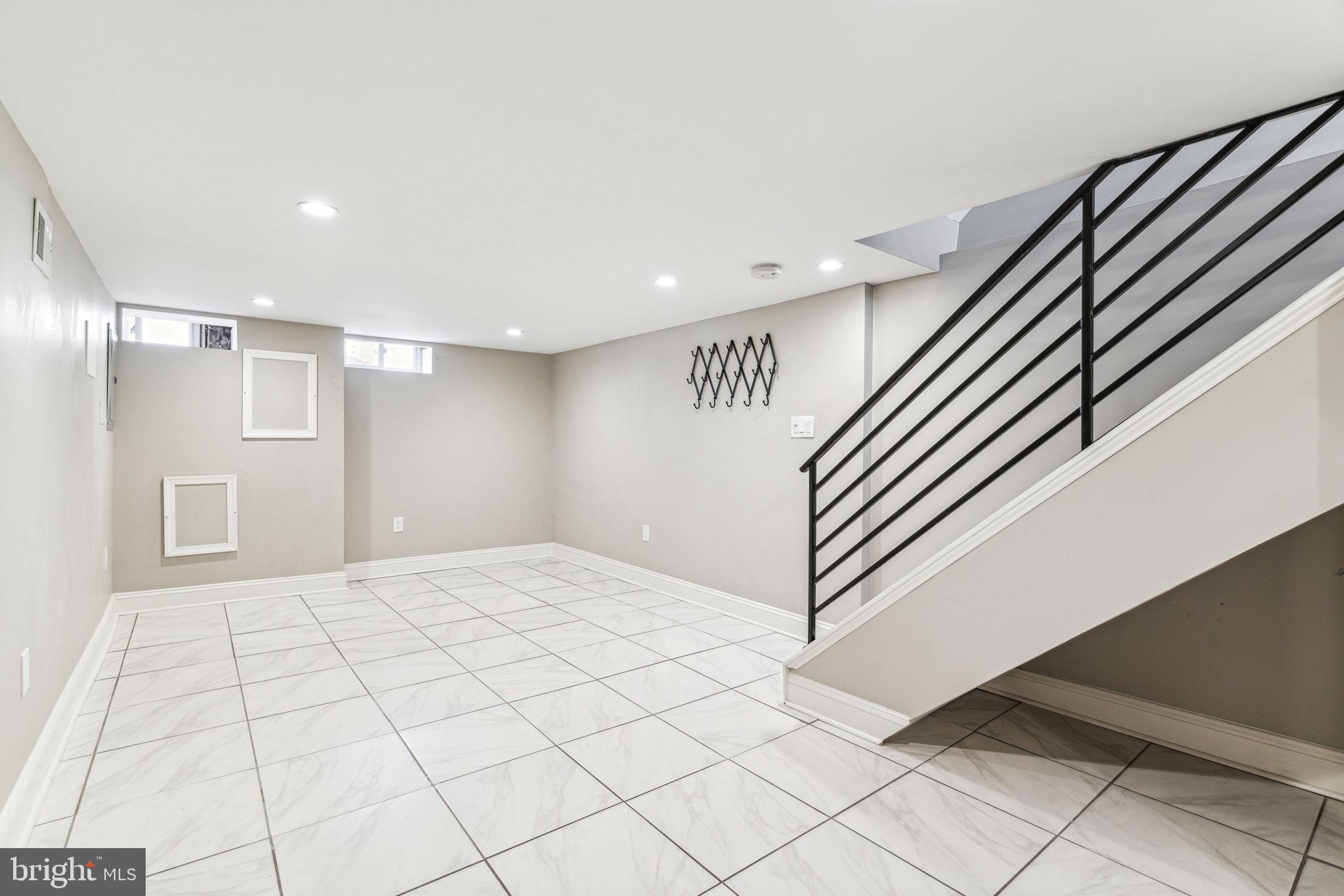 412 Tree Street Philadelphia, PA 19148 - Photo 40 of 43 Fully finished basement with laundry