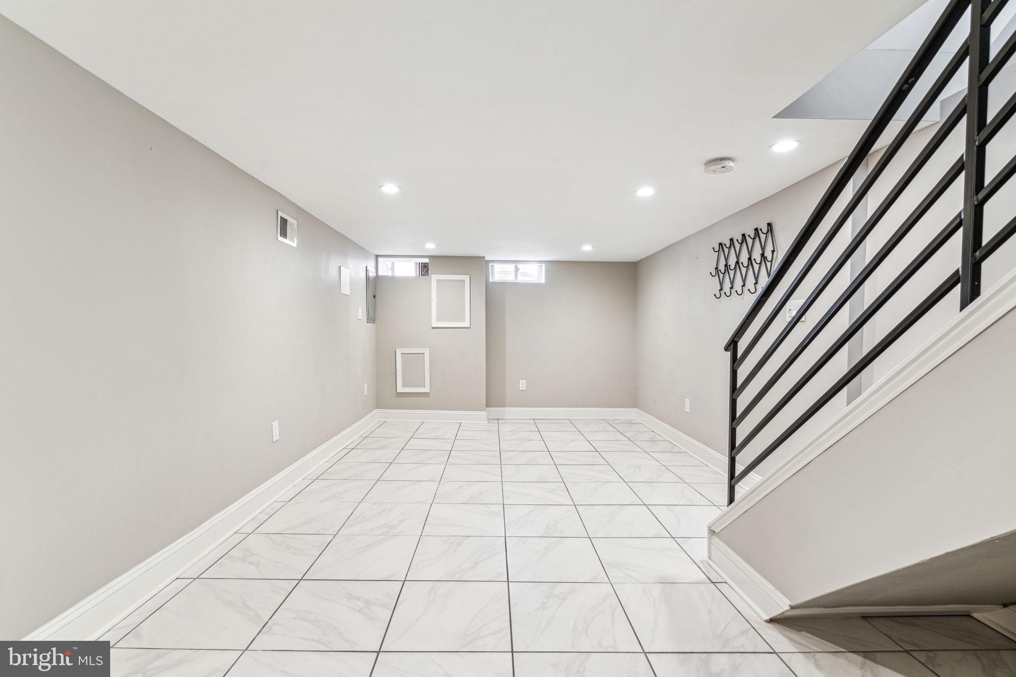 412 Tree Street Philadelphia, PA 19148 - Photo 42 of 43 Fully finished basement with laundry