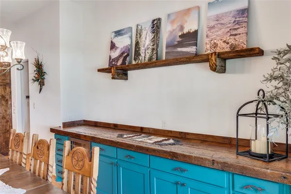 a bedroom with a bed and cabinets