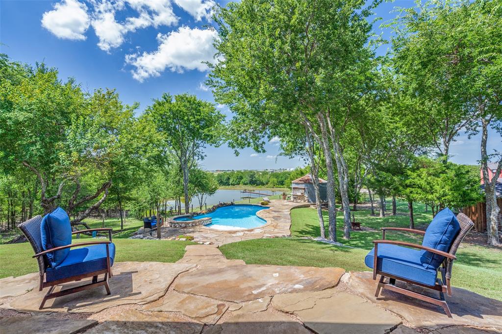 626 Lone Tree Road Nevada, TX 75173 - Photo 29 of 40 a view of a backyard with sitting area