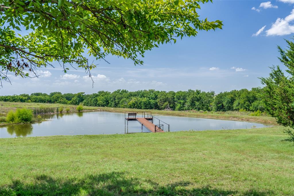 626 Lone Tree Road Nevada, TX 75173 - Photo 31 of 40 a view of lake from a yard