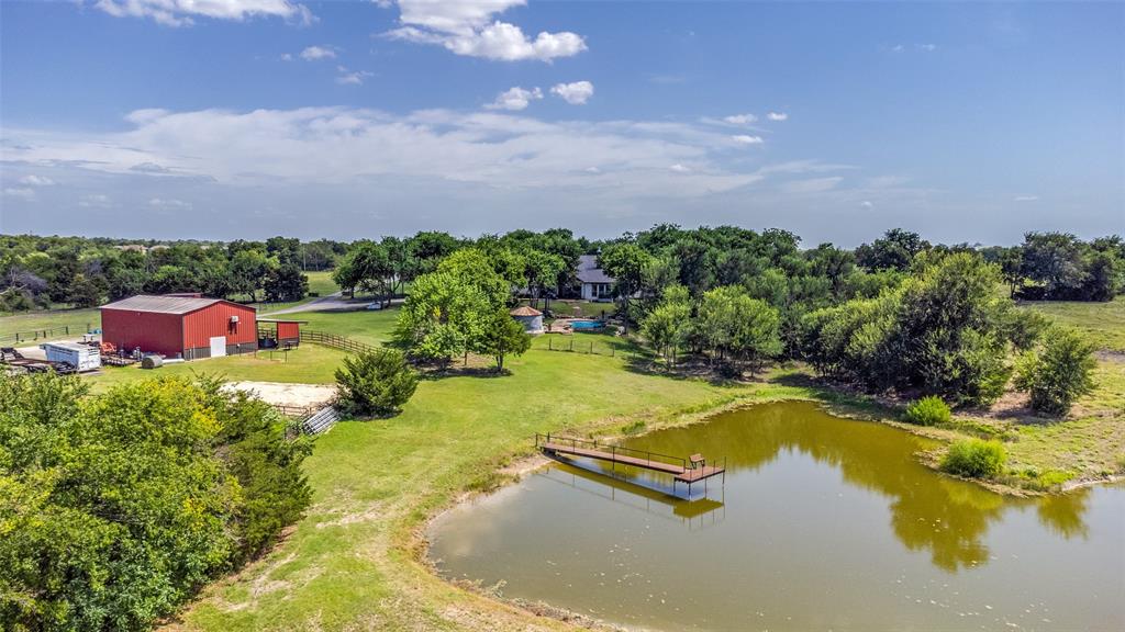 626 Lone Tree Road Nevada, TX 75173 - Photo 35 of 40 an aerial view of a house with swimming pool outdoor seating and yard