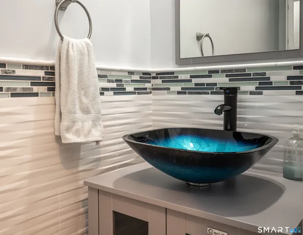 a kitchen with a sink and a stove