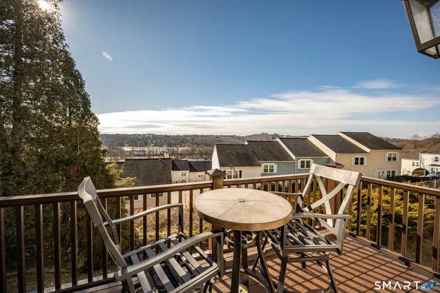a view of a chairs and table on the terrace