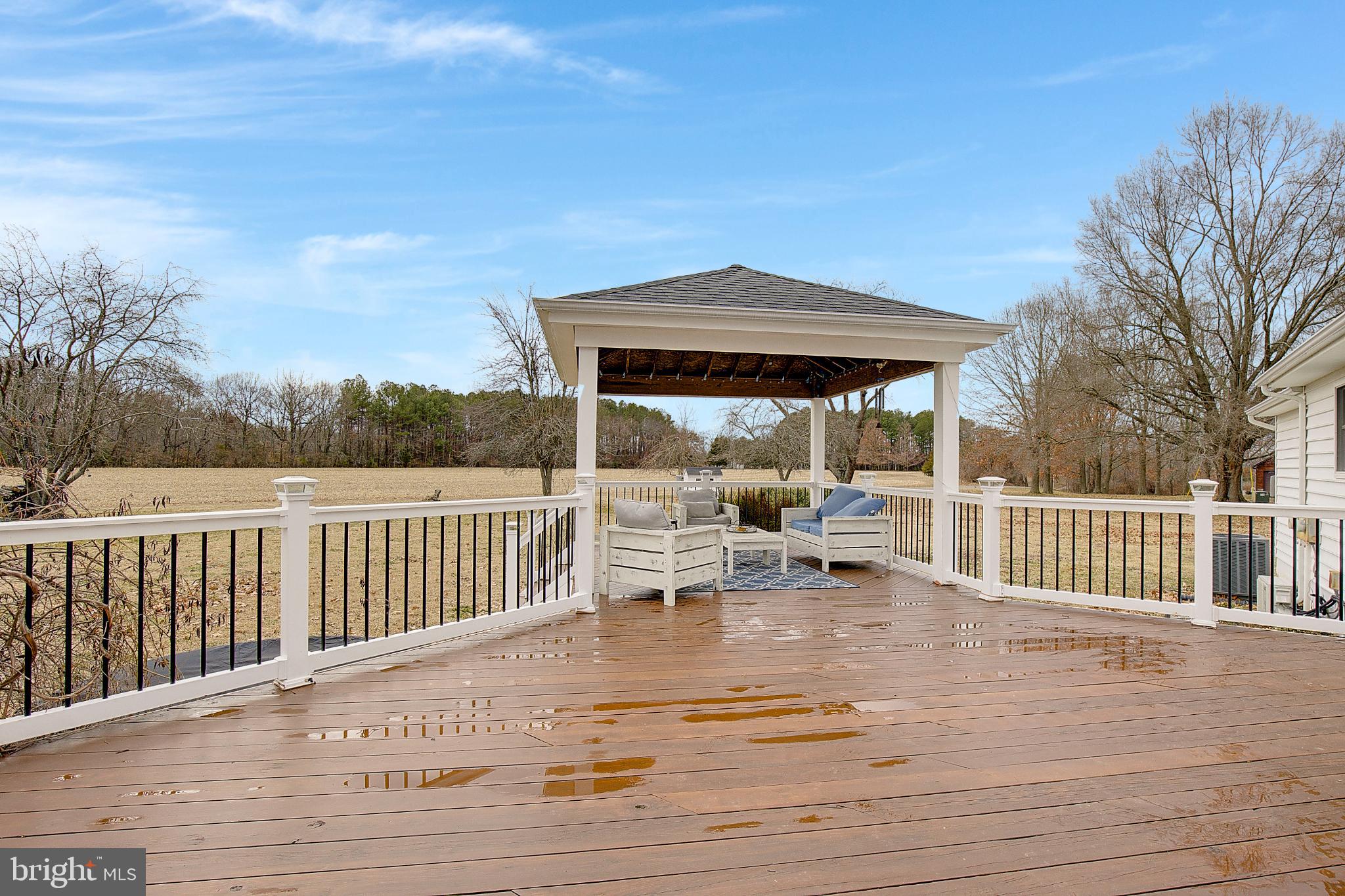 3406 Horn Road Huntingtown, MD 20639 - Photo 45 of 74 Spacious deck with serene countryside views.