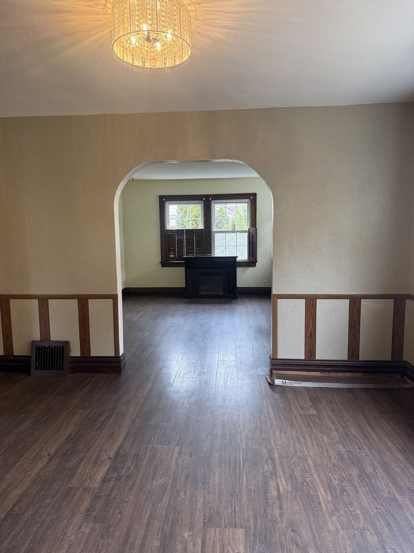 3035 Peoria Street Steger, IL 60475 - Photo 4 of 19 wooden floor in an empty room with a window