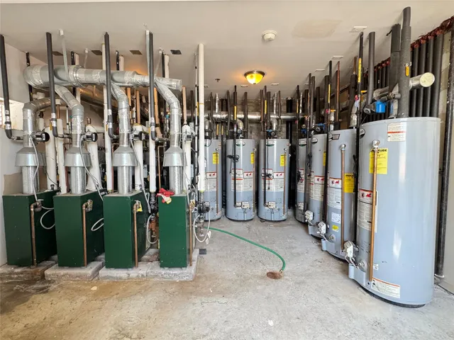 a view of a building with parking space