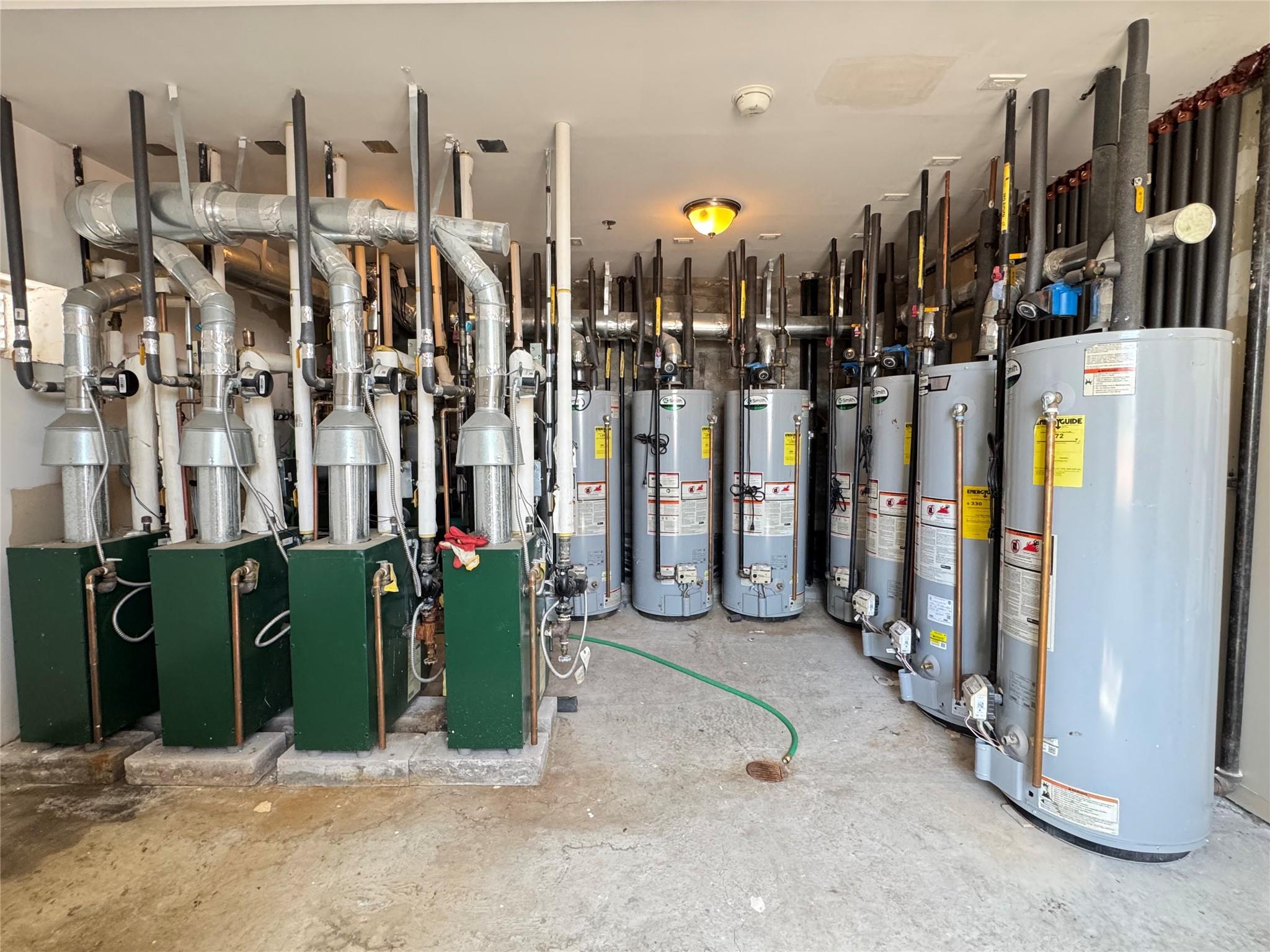 53-12 102nd Street Queens, NY 11368 - Photo 8 of 8 a view of a building with parking space