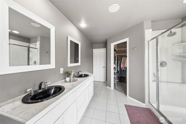 a kitchen with a sink and a refrigerator