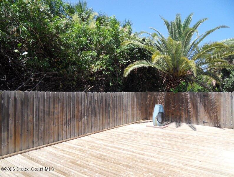 120 Cortez Street Melbourne Beach, FL 32951 - Photo 5 of 7 a view of wooden fence and floor