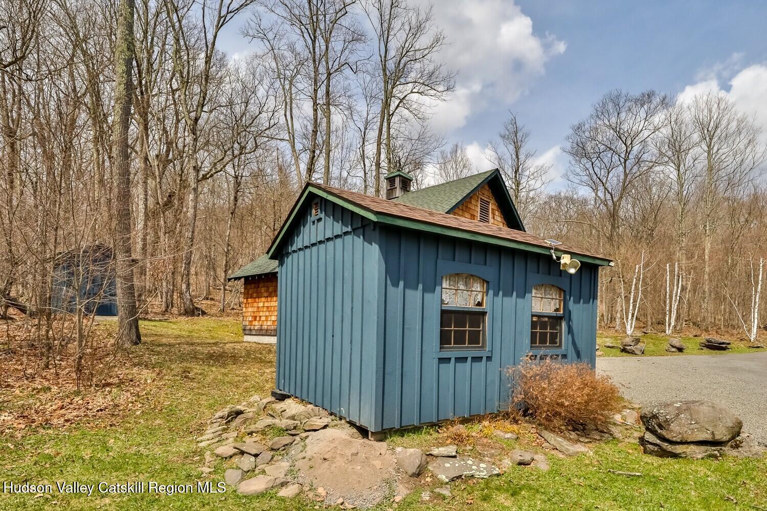 15 Hardwood Road West Kill, NY 12492 - Photo 25 of 53 a front view of a house with garden