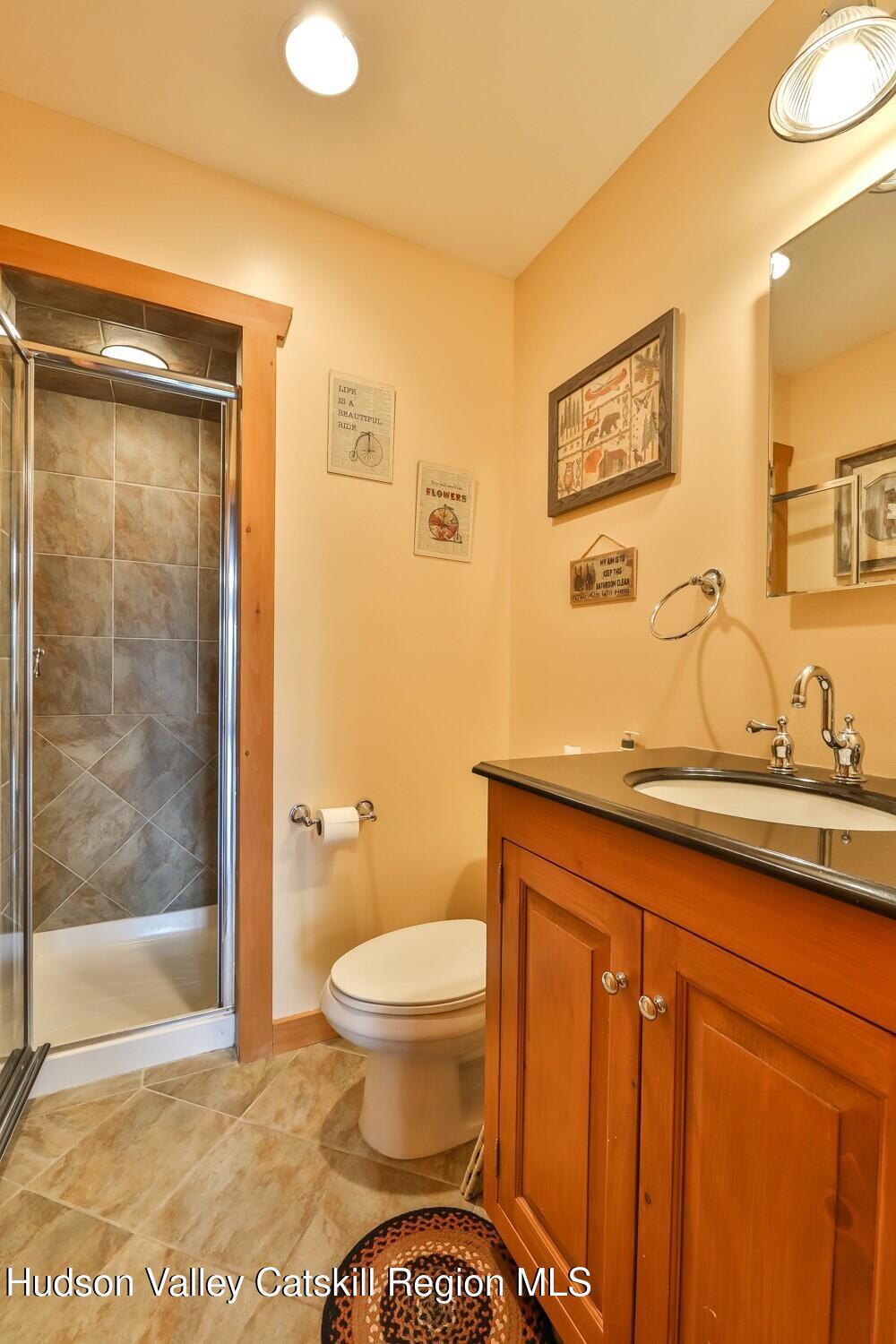 15 Hardwood Road West Kill, NY 12492 - Photo 46 of 53 a bathroom with a sink a toilet and shower