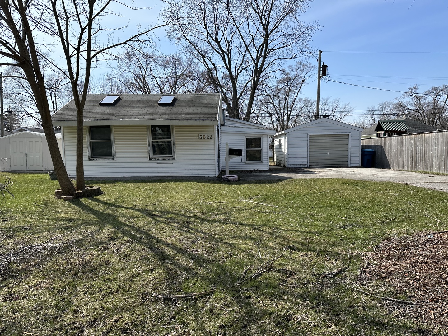 3622 Morgan Street Steger, IL 60475 - Photo 13 of 14 a house that has a tree in front of it