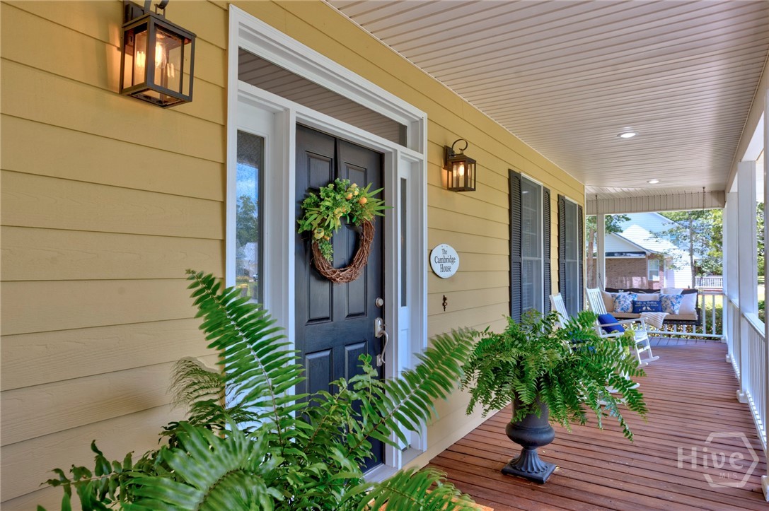 129 Cambridge Drive Rincon, GA 31326 - Photo 32 of 37 Partial front porch