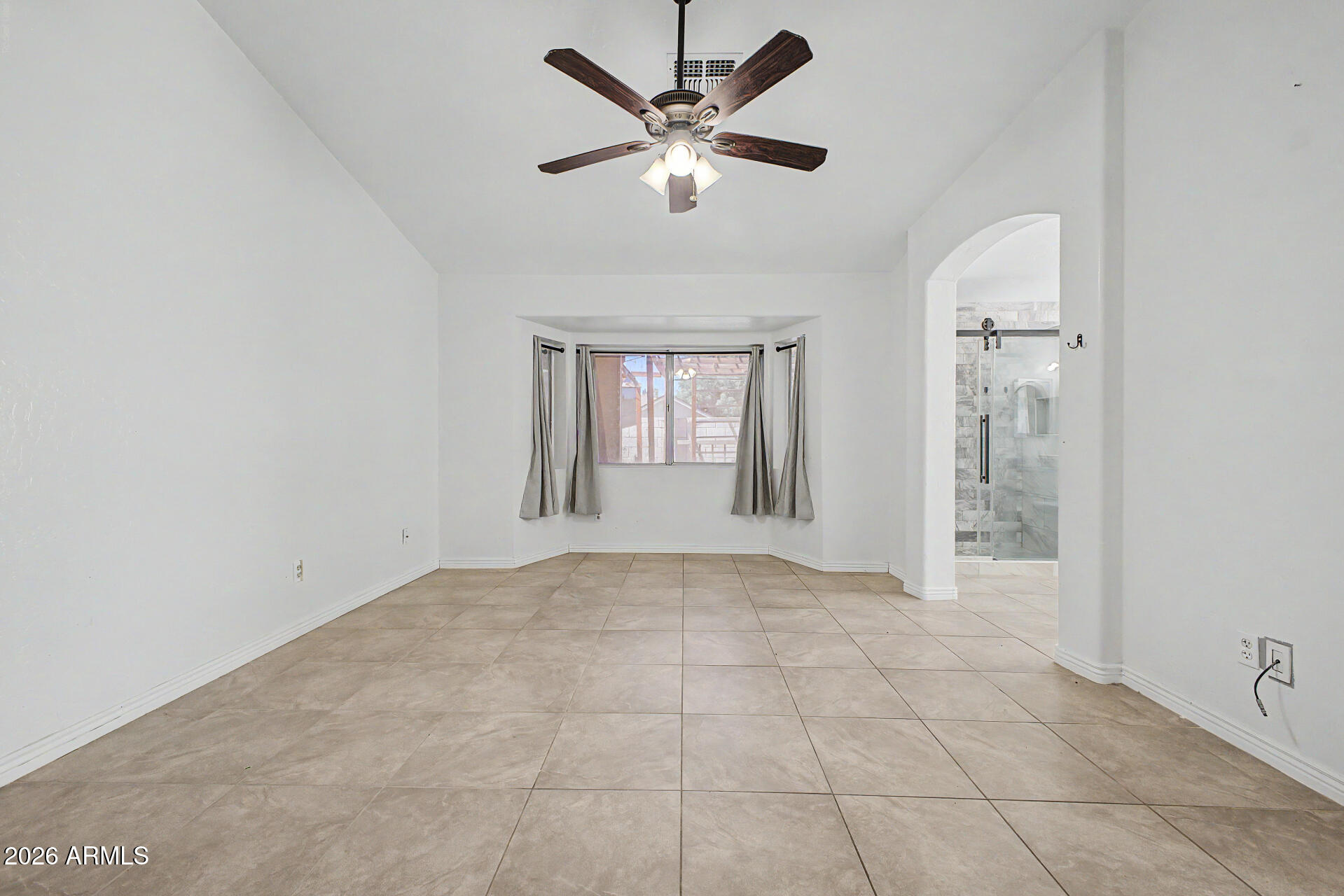 156 North Nielson Street Gilbert, AZ 85234 - Photo 13 of 32 a view of an empty room with a window